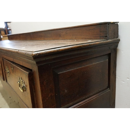 637 - 18th century oak sideboard, the galleried back with lip and three drawers above carved apron, 78cm h... 