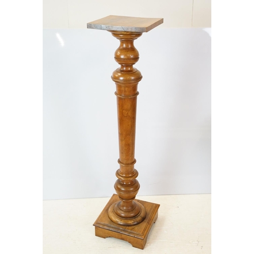 641 - Early 20th century walnut torchere, 111cm high x 28.5cm wide x 29cm deep