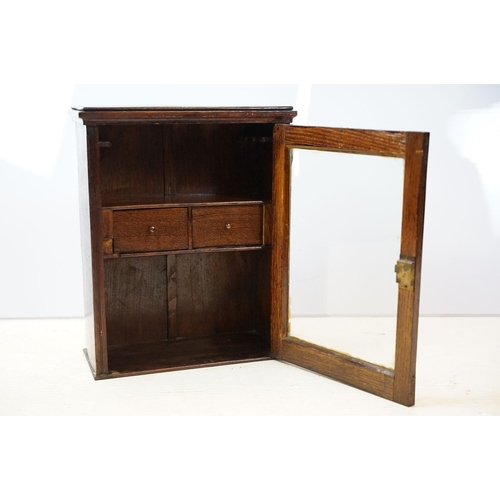 646 - Early 20th century oak glazed wall hanging cabinet, with shelf and two drawers, 44cm high x 36cm wid... 