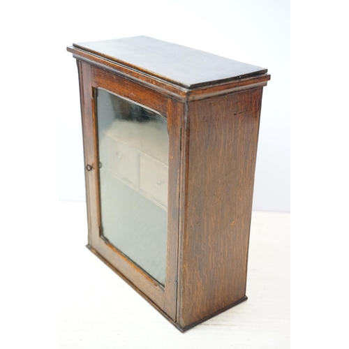 646 - Early 20th century oak glazed wall hanging cabinet, with shelf and two drawers, 44cm high x 36cm wid... 