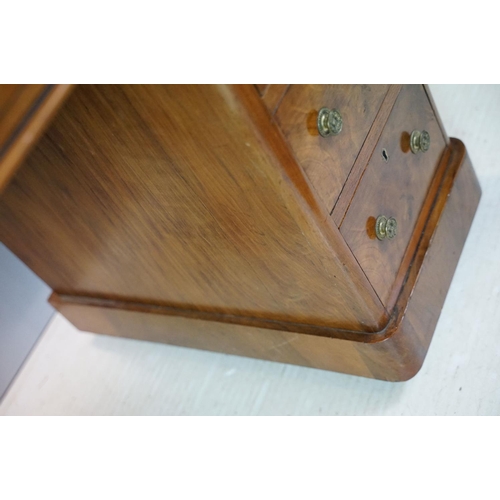 649 - Late 19th century walnut lady's kneehole desk, with cream leather inset top above an arrangement of ... 