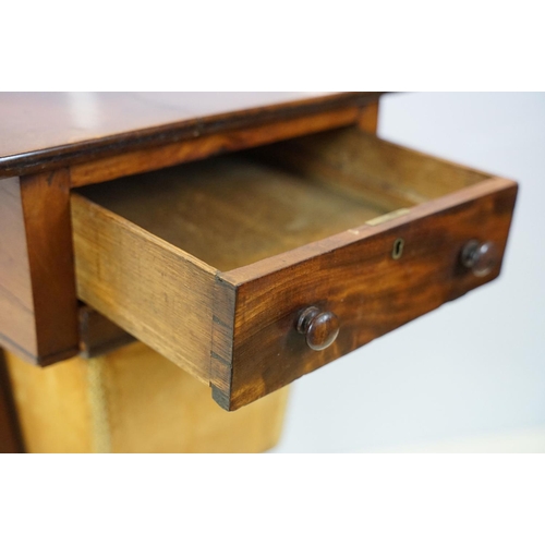 650 - Victorian mahogany work table, with drawer above sliding drawer front opening to reveal storage, on ... 