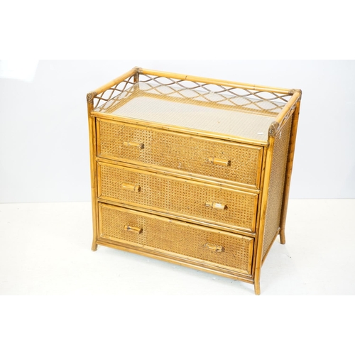 654 - Rattan chest with galleried, glazed top above three drawers, 80cm high x 82cm wide x 47cm deep toget... 