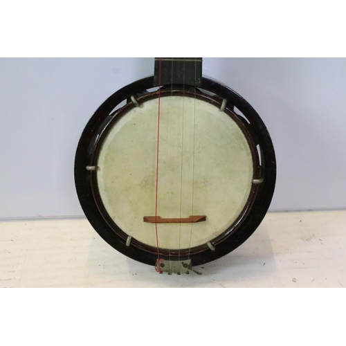 184 - Keech banjilele banjo with animal hide drum with fitted case. Measures 55cm.