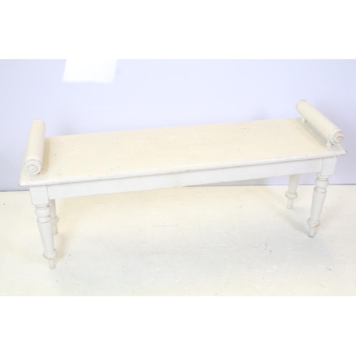 636 - Early 20th century painted pine bench, the two ends with scroll handles, on turned tapering legs, 51... 