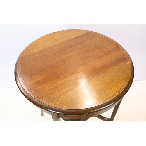 642 - Early 20th century circular mahogany inlaid occasional table, with tier below on splayed legs, 70.5c... 