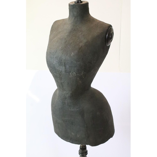 645 - Early 20th century dressmaker's dummy on black painted wooden tripod base, 160cm high