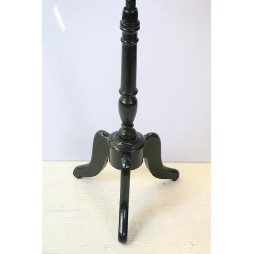 645 - Early 20th century dressmaker's dummy on black painted wooden tripod base, 160cm high