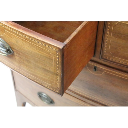 651 - Edwardian mahogany bow front inlaid chest of two short and two long drawers on splayed legs, 87cm hi... 