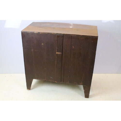 651 - Edwardian mahogany bow front inlaid chest of two short and two long drawers on splayed legs, 87cm hi... 