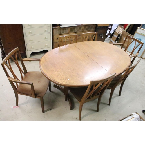 652 - G Plan oval extendable dining table, 72cm high x 162cm long (unextended) x 106cm wide and six chairs... 