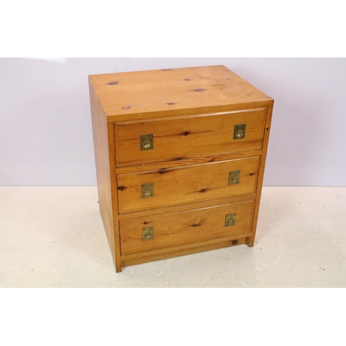 655 - Pine chest of three drawers with brass recessed handles, 58.5cm high x 53cm wide x 41cm deep