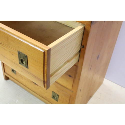 655 - Pine chest of three drawers with brass recessed handles, 58.5cm high x 53cm wide x 41cm deep