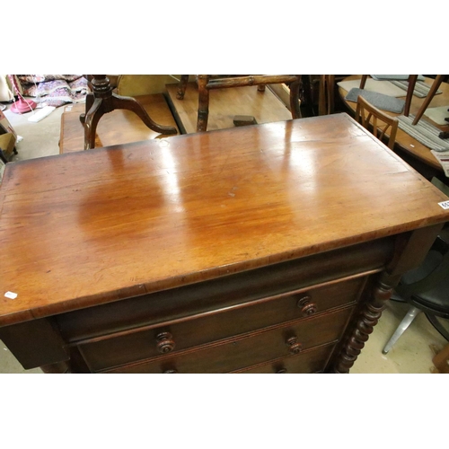 657 - 19th century mahogany chest of four long drawers, the top drawer of concealed appearance, with barle... 