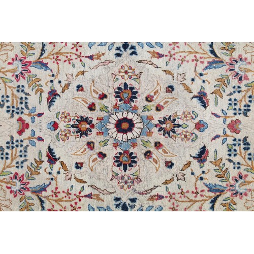 690 - Middle Eastern carpet rug having a white ground with blue florals to central panel and border. Measu... 