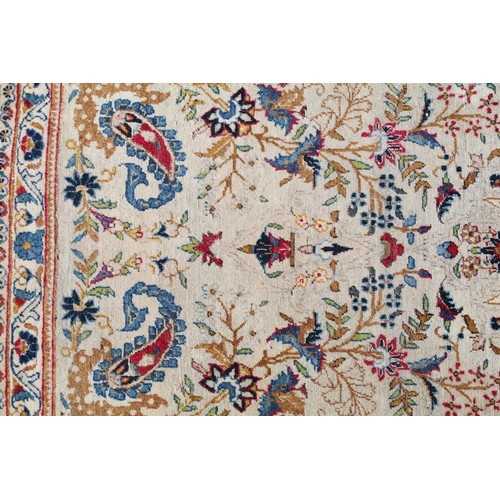 690 - Middle Eastern carpet rug having a white ground with blue florals to central panel and border. Measu... 