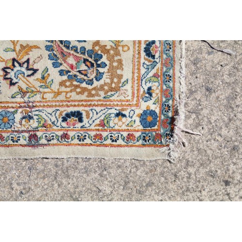 690 - Middle Eastern carpet rug having a white ground with blue florals to central panel and border. Measu... 