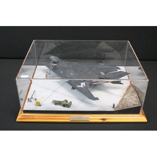 1064 - Two cased aircraft model dioramas to include a Shaba F-117A Stealth Desert Storm by Ian Ruscoe showi... 