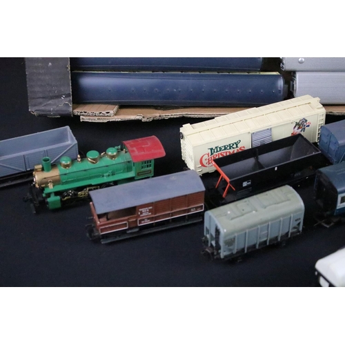 119 - Over 50 OO gauge items of rolling stock to include coaches, wagons, tankers and vans plus a Bachmann... 