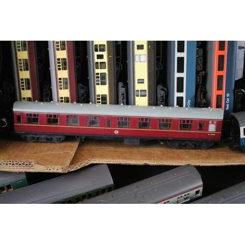 129 - 50 OO gauge items of rolling stock featuring various coaches and carriages to include Hornby, Triang... 