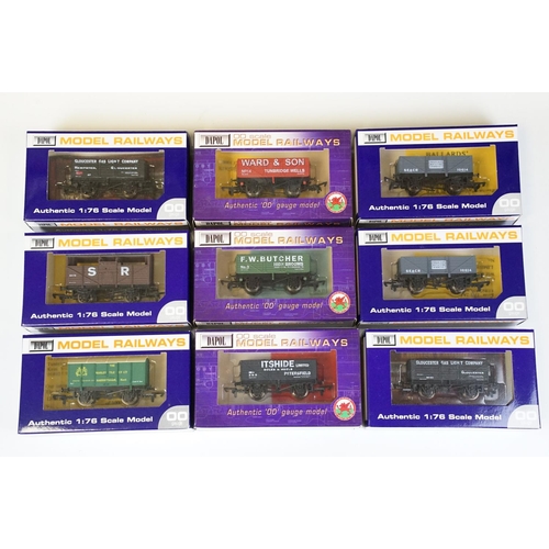 61 - 49 Boxed Dapol OO gauge items of rolling stock featuring coaches and wagons with some custom example... 
