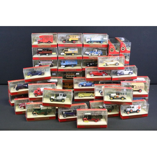 1080 - 54 Boxed Matchbox Models of Yesteryear diecast models in red window boxes, all ex