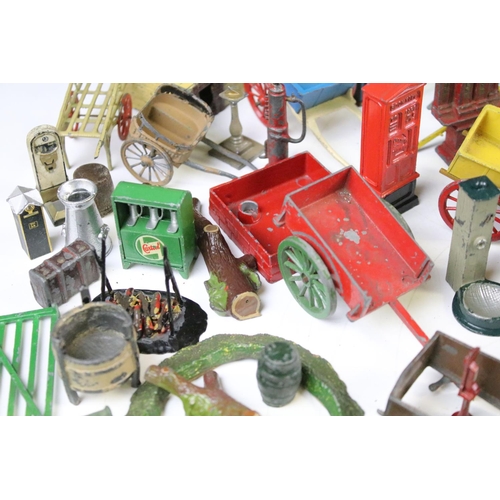 1328 - Large quantity of mainly Britains and some Dinky accessories to include horse carts, push carts, mil... 