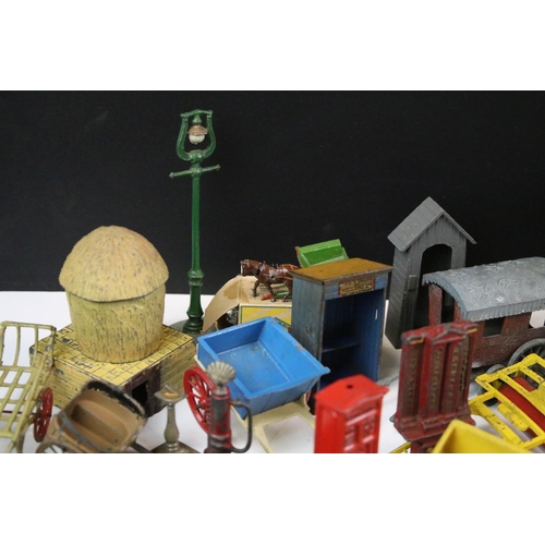 1328 - Large quantity of mainly Britains and some Dinky accessories to include horse carts, push carts, mil... 