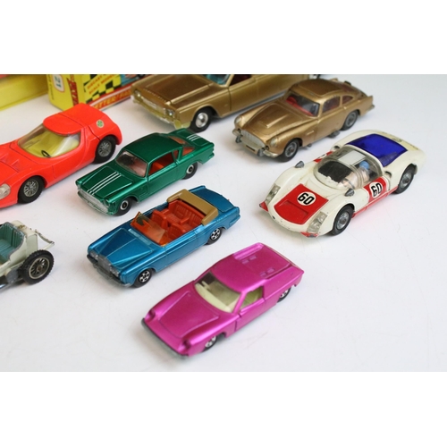 1332 - Three boxed diecast models to include boxed Dinky 176 NSU Ro 80 in burgundy, cased Dinky 187 De Toma... 