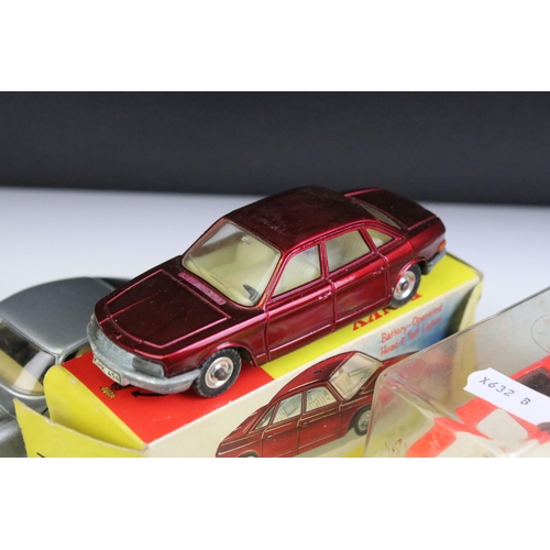 1332 - Three boxed diecast models to include boxed Dinky 176 NSU Ro 80 in burgundy, cased Dinky 187 De Toma... 