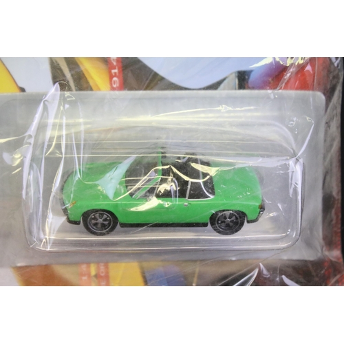 1284 - 34 carded diecast models to include A Century Of Cars and DeAgostini, all in bags with carded backin... 