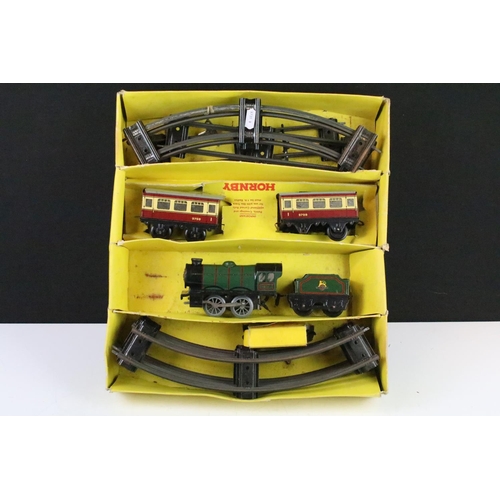 115 - Boxed Hornby O gauge No 21 Passenger Set with locomotive, 2 x items of rolling stock and track, tatt... 