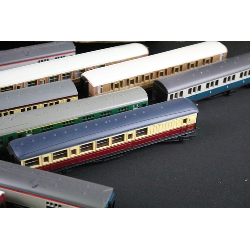129 - 50 OO gauge items of rolling stock featuring various coaches and carriages to include Hornby, Triang... 