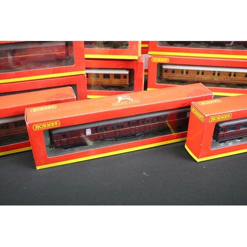 187 - 26 Boxed Hornby OO gauge items of rolling stock to include R4263A BR 61ft 6in Buffet Car E9127 E, R4... 