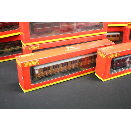 187 - 26 Boxed Hornby OO gauge items of rolling stock to include R4263A BR 61ft 6in Buffet Car E9127 E, R4... 