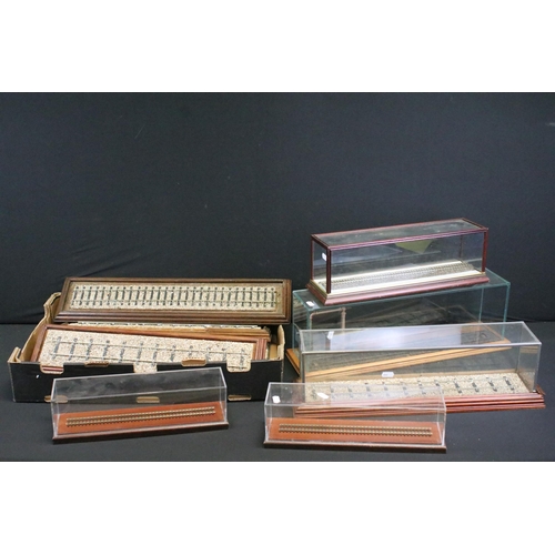 223 - Five locomotive display cases with wooden plinth and glass casing, 2 x O gauge and 3 x OO gauge, plu... 