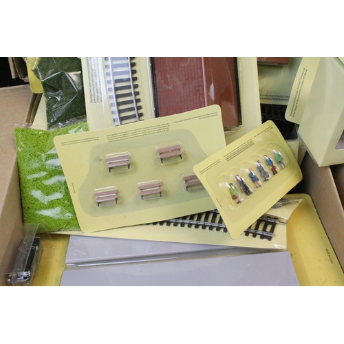 224 - Collection of Hatchette Your Model Railway Village accessories to include scenery, figures, tracksid... 