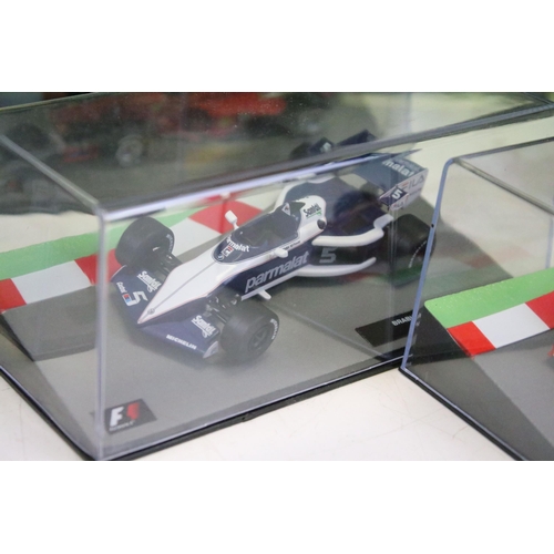 1285 - 38 Boxed Panini 1/43 Formula 1 diecast model cars to include Mario Andretti's 1978 Lotus 79, Miks Ha... 