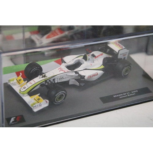 1285 - 38 Boxed Panini 1/43 Formula 1 diecast model cars to include Mario Andretti's 1978 Lotus 79, Miks Ha... 