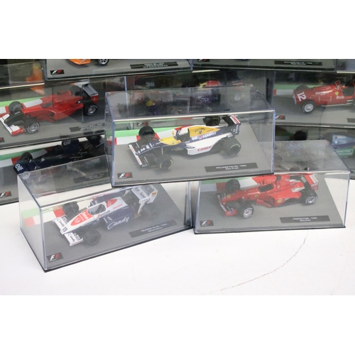 1285 - 38 Boxed Panini 1/43 Formula 1 diecast model cars to include Mario Andretti's 1978 Lotus 79, Miks Ha... 