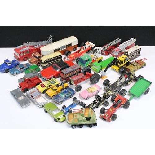 1286 - Around 30 play worn diecast models from the 1960s onwards to include Triang Spot On, Corgi, Lonestar... 