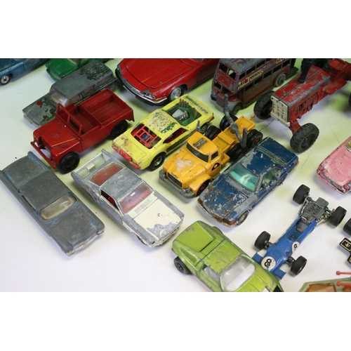 1286 - Around 30 play worn diecast models from the 1960s onwards to include Triang Spot On, Corgi, Lonestar... 