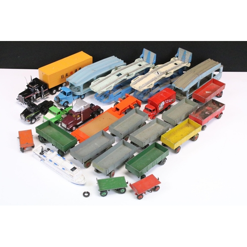 1303 - 24 Play worn commercial diecast models, mainly from the mid 20th C to include Dinky Car Transporter,... 