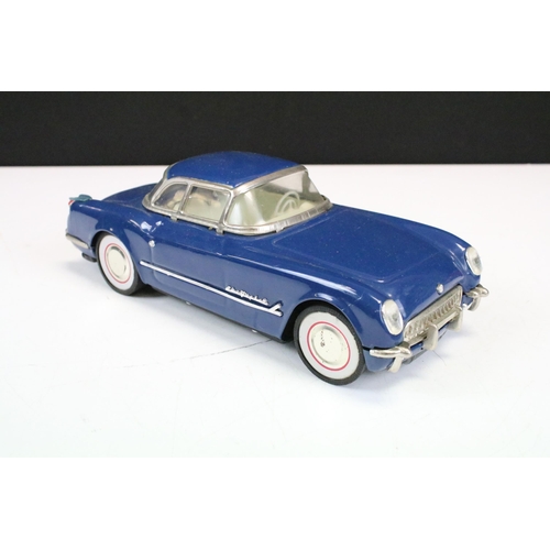 1304 - Six 1/18 - 1/24 scale tin plate metal models including a friction drive red/white car with driver (m... 