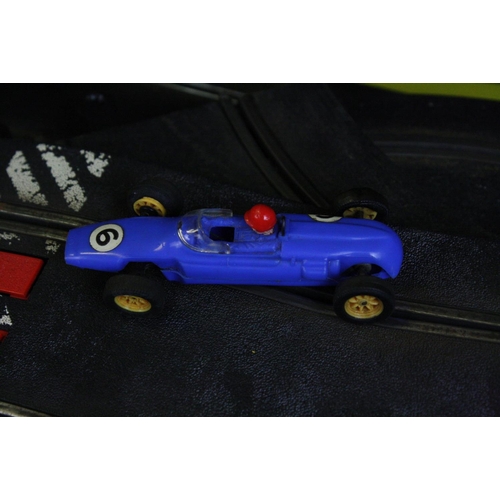 348 - Boxed Triang Scalextric Set 40 containing C6 Cooper slot car in blue, C767 Lotus in red (af), track ... 