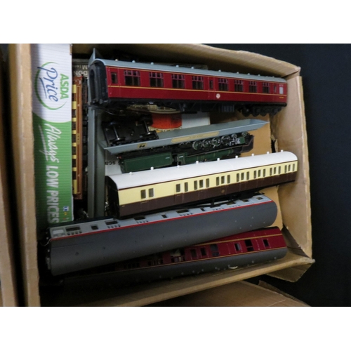 241 - Quantity of OO gauge model railway accessories to include rolling stock, boxed kits and items to inc... 