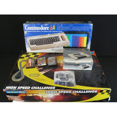 365 - Collection of various toys and games to include retro gaming and Scalextric featuring Boxed Commodor... 