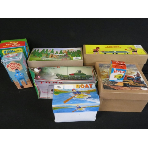 379 - Collection of various boxed toys to include model rail, tin plate and diecast models featuring Palit... 