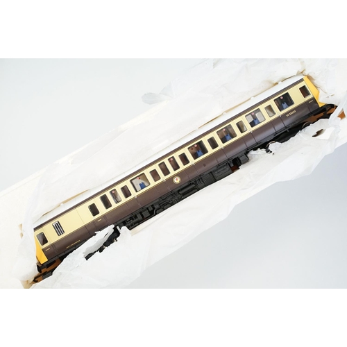 54 - Four boxed HO/OO gauge locomotives and carriages to include Hornby R2644 Class 121 Driving Motor Bra... 