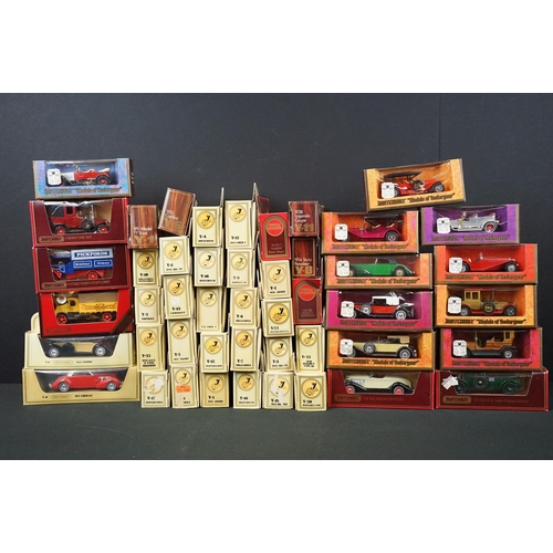 1148 - 46 Boxed Matchbox Models Of Yesteryear diecast models to include red, cream and wood style boxes, al... 